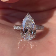 Pear Shaped Moissanite Hidden Halo Engagement Ring